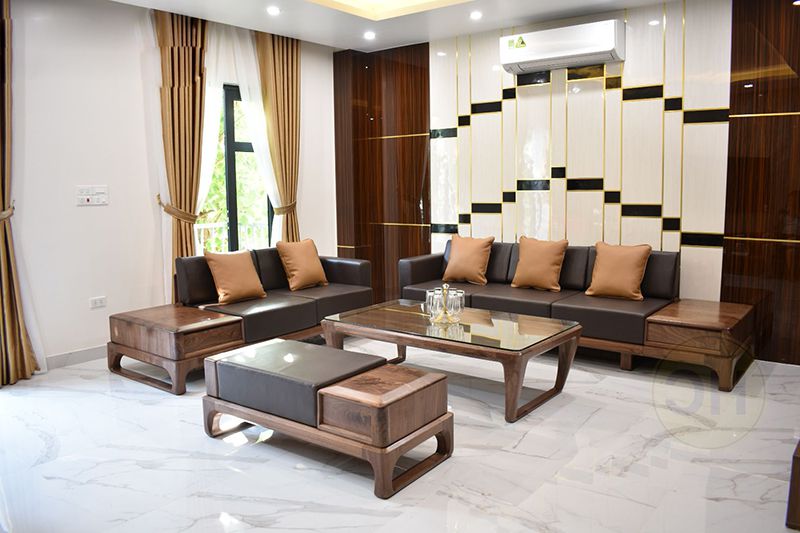 bộ bàn ghế sofa gỗ óc chó bọc da thật