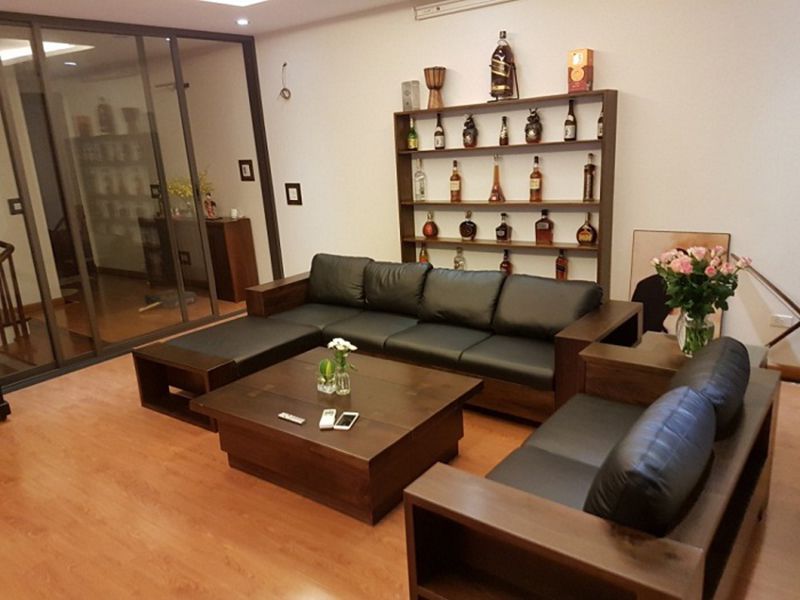 bộ bàn ghế sofa gỗ óc chó bọc da màu đen