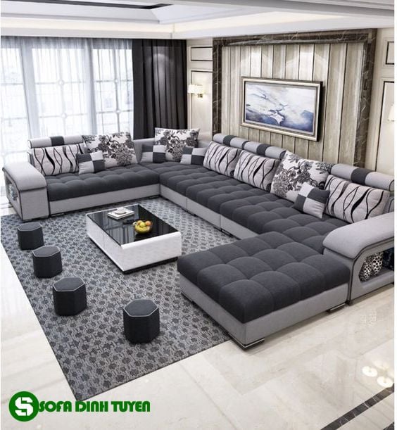 Mẫu sofa phòng khách lớn đẹp nhất - Chiếc sofa phòng khách lớn đẹp nhất không chỉ là nơi bạn dừng chân sau một ngày làm việc mệt mỏi, mà còn là trung tâm của không gian sống của bạn. Với thiết kế tối giản và hợp thời trang, đây sẽ là lựa chọn tuyệt vời để tăng thêm sự sang trọng cho căn phòng của bạn. Hãy xem hình ảnh để cảm nhận trọn vẹn sức hút của sofa này!