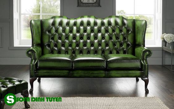 ghế sofa bọc da màu xanh lá cây