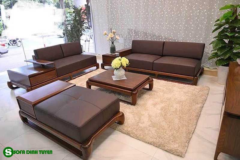Ghế sofa gỗ đệm bọc da khung gỗ óc chó.