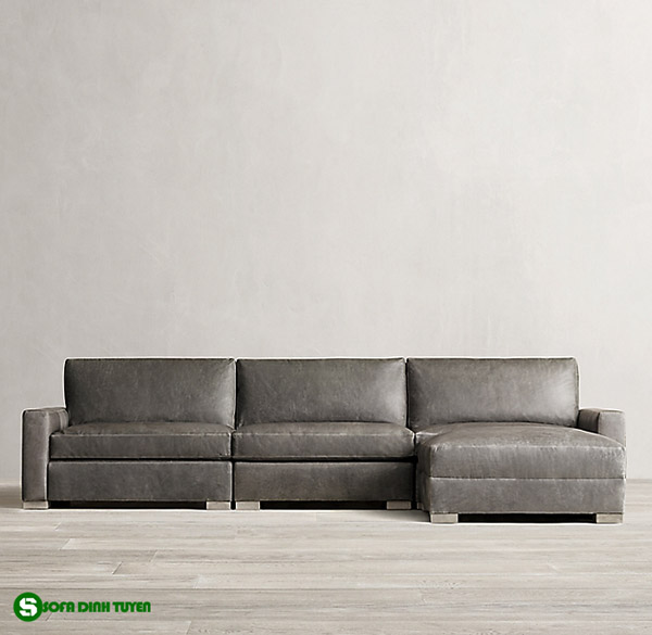 Ghế sofa góc bọc da màu đen nằm xem tivi