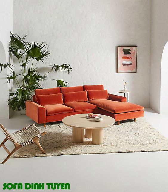 ghế sofa nỉ nhung màu cam chân gỗ